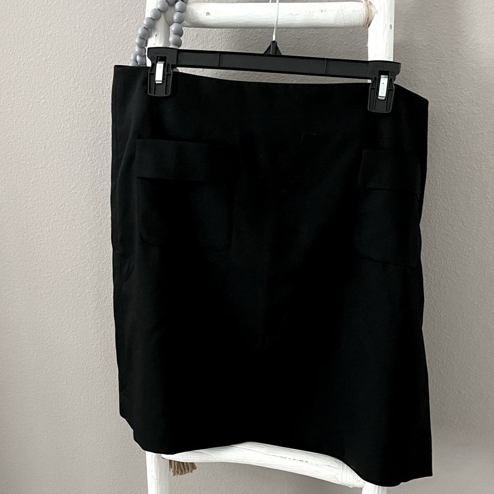 Loft size 14, 21in skirt. Not quite a-line- not completely straight